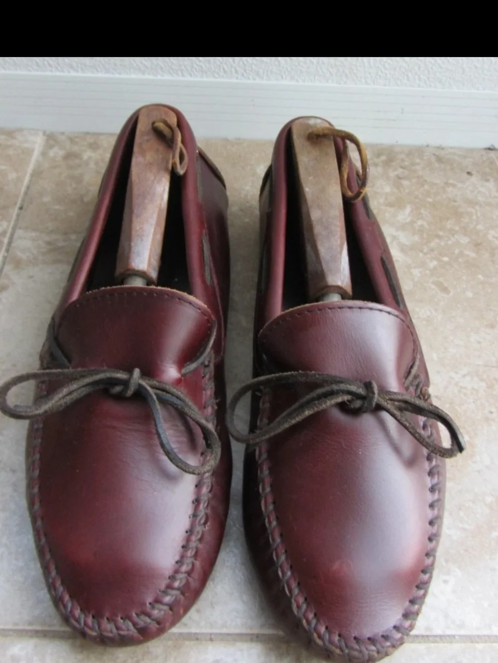 Minnetonka Men's Burgundy Leather Moc Toe Slip-Ons